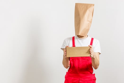 delivery service, fast food and people concept - happy man with coffee and disposable paper bag photo