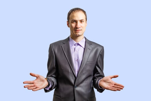 the businessman at a gray wall photo