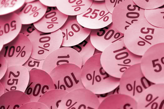 Large amount of stickers with yellow percentage values for black friday or cyber monday sale. Abstract image of discount prices Image toned in Viva Magenta, color of the 2023 year photo