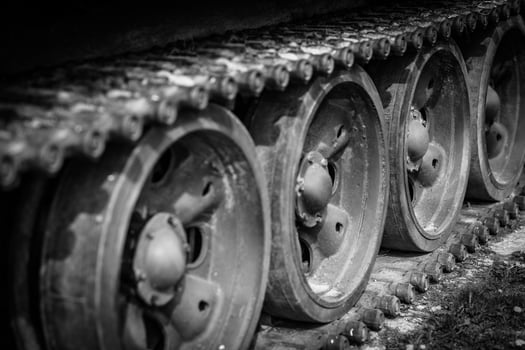 Detail shot with old tank tracks and wheels photo