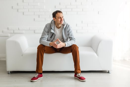 A young man of European appearance at home. Remote work, quarantine during an epidemic of coronavirus COVID-19 photo