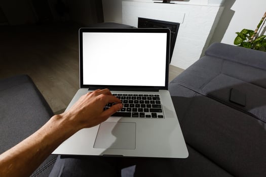 Using laptop with blank screen - POV - Point of view perspective photo
