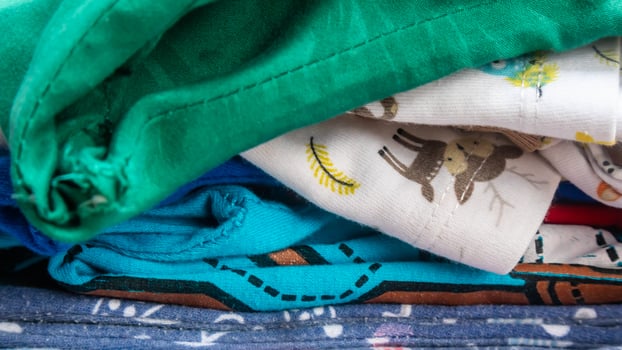stack of clothes as background photo