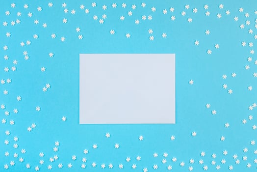 Winter pattern made of small white snowflakes photo