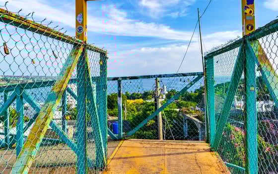 Pedestrian bridge overpass passerelle walkway skyway in Puerto Escondido Mexico. photo