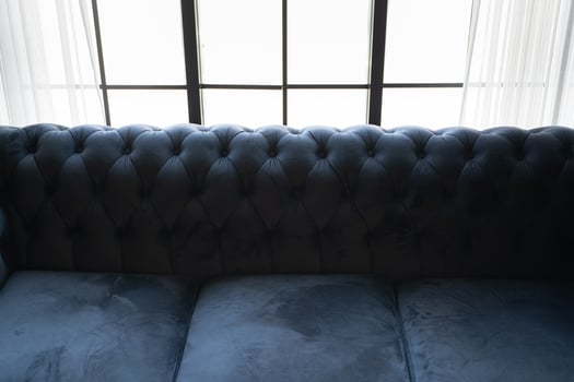 Sofa Chester in an interior. seat leather sofa. Selective focus. photo