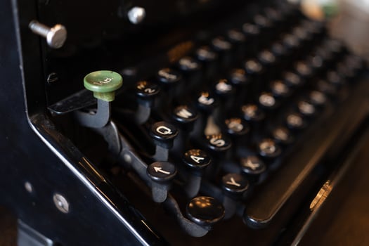vintage typewriter keys with selective focus. Antique Typewriter. Vintage Typewriter Machine Closeup Photo. photo