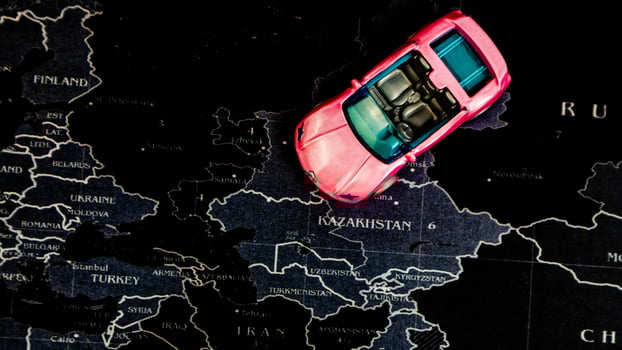 Minahasa, Indonesia  December 2022, pink toy car over map photo