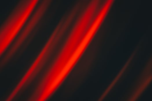 Red waves on black, background. photo