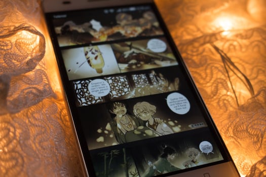 Closeup Of Smart Phone With Web Comics On It in Karachi Pakistan 2022 photo
