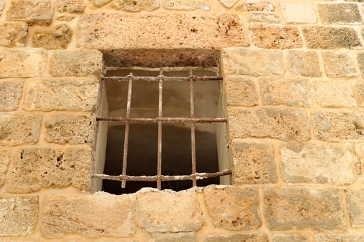A small window in a residential building in a big city photo