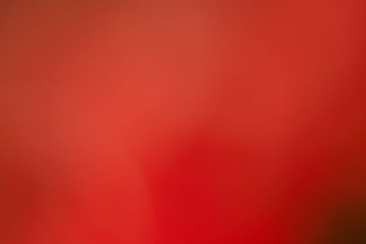 Abstract red defocused background. Blurred background red with black. photo