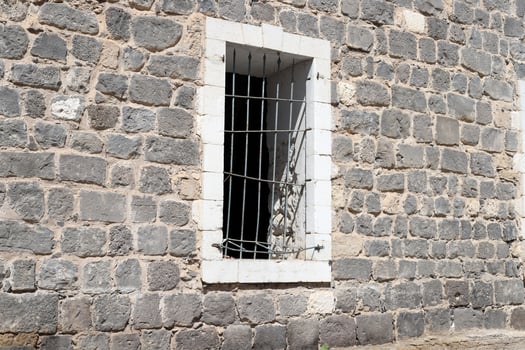 A small window in a residential building in a big city photo