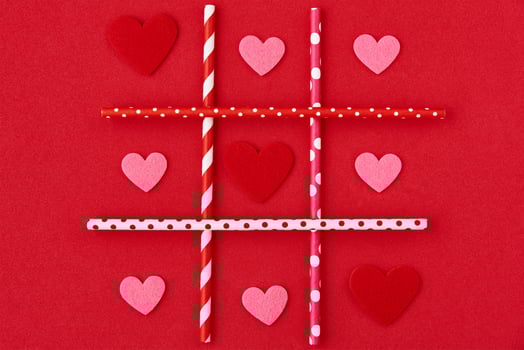 Valentines day. Hearts on red background, creative concept photo