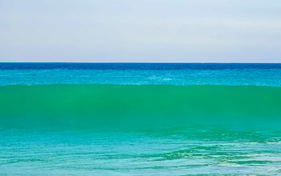 Extremely huge big surfer waves at beach Puerto Escondido Mexico. photo