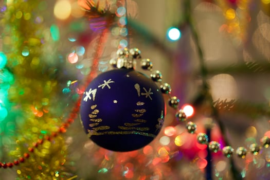 Christmas bauble on christmas tree photo