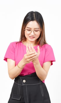 Suffering pain on hands Of Beautiful Asian Woman Isolated On White Background photo