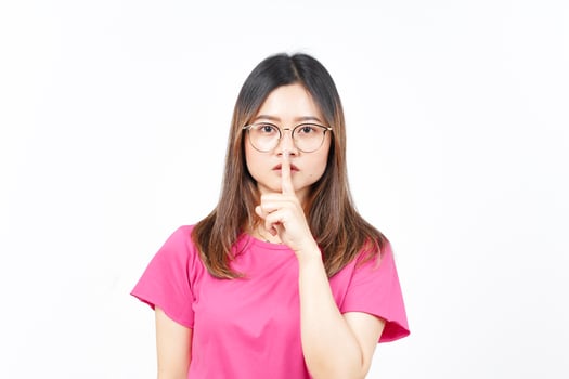 Shh Be Quiet Of Beautiful Asian Woman Isolated On White Background photo