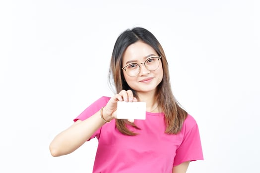 Holding Blank Bank Card Or Credit Card Of Beautiful Asian Woman Isolated On White Background photo