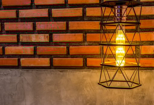 Vintage lamp decorated with Brown brick wall vintage background photo