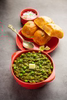 Hariyali green Pav bhaji is a variation of a traditional pav bhaji made using leafy vegetables photo