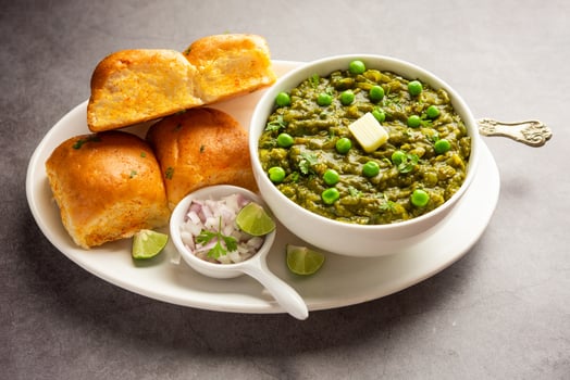 Hariyali green Pav bhaji is a variation of a traditional pav bhaji made using leafy vegetables photo