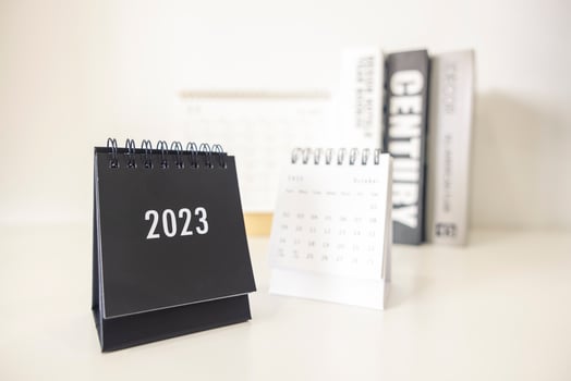 2023 business calendar on office table in new year day. Make a work plan for the start of the year. Concept about Celebration, Business, Christmas, New Year. photo