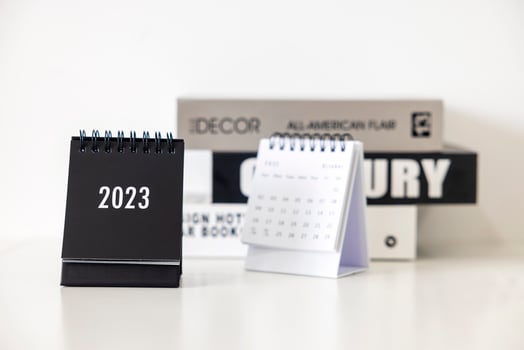 2023 business calendar on office table in new year day. Make a work plan for the start of the year. Concept about Celebration, Business, Christmas, New Year. photo