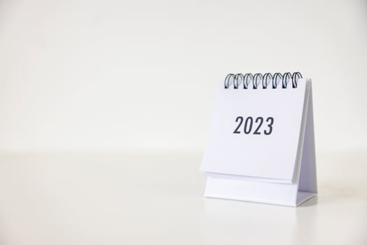 2023 business calendar on office table in new year day. Make a work plan for the start of the year. Concept about Celebration, Business, Christmas, New Year. photo