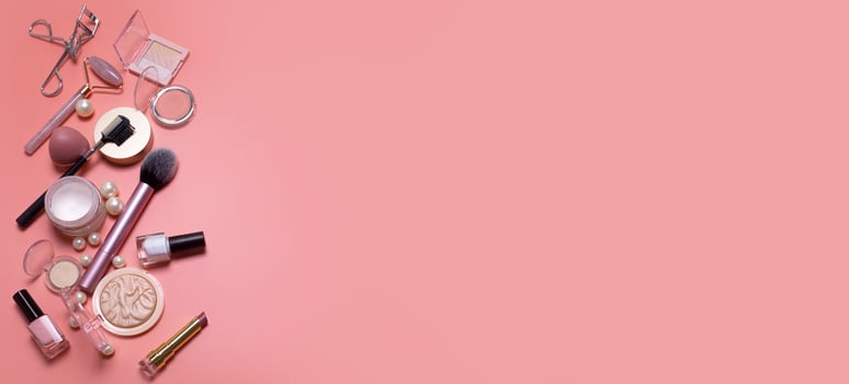 Pink beauty background with facial cosmetic, make-up products. Free space for text, copy space. Modern layout, top view, flat lay. Make up, skin care, beauty concept. photo