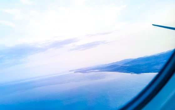 Flying in plane over coast of Oaxaca Mexico. photo