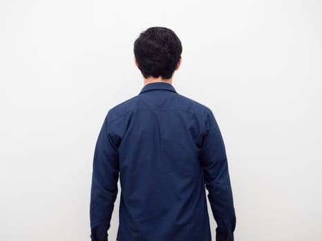 Man standing turn back on white background photo