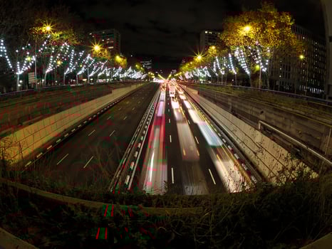 traffic jam in madrid castilla place at night with car lights tracks photo