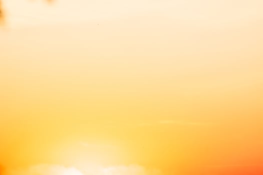 beautiful gradient orange clouds and sunlight on the blue sky perfect for the background, take in everning,Twilight photo