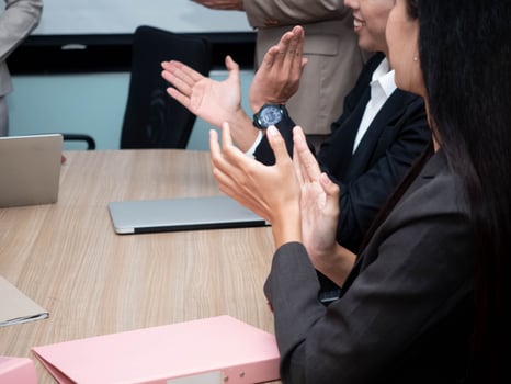 businessman businesswoman person group of people applauding meeting cheerful hand finger male female seminar conference celebration boss manager company success performance congratulation achievement photo