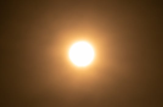 The sun on the yellow sky blur focus photo