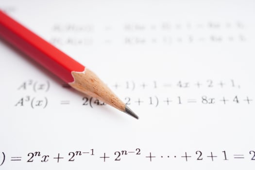 Pencil on mathematic formula exercise test paper in education school. photo
