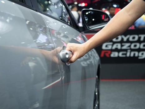 Man hand catch at door car gray color photo