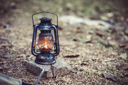 Old fashioned lantern with flame photo