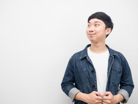 Man jeans shirt smiling happy emotion looking at copy space photo