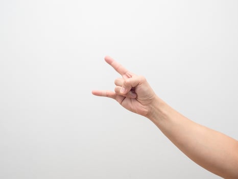 Man hand gesture finger rock isolated white photo