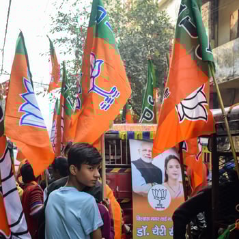 Delhi, India, December 02 2022  - Bharatiya Janata Party BJP supporter during mega road show in support of BJP candidate Pankaj Luthara to file nomination papers ahead of MCD local body Elections 2022 photo
