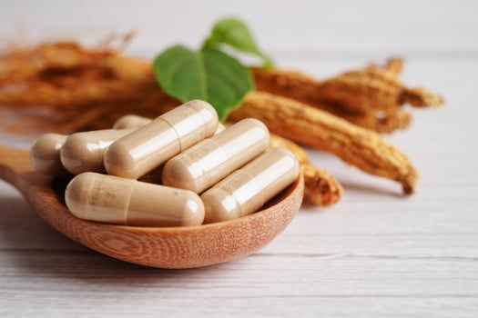 Ginseng roots and green leaf, healthy food. photo