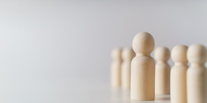 Wooden figures on white background. teamwork, leadership and business team creative thinking and human resources, Recruitment employee concept photo