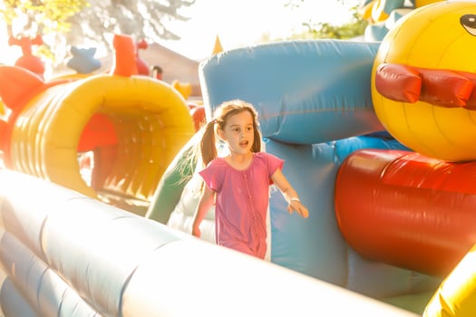 Cute little girl in amusement park photo