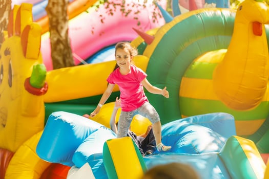 Cute little girl in amusement park photo