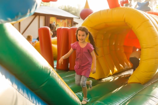 Cute little girl in amusement park photo