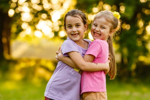 two little friends girls in the field. photo