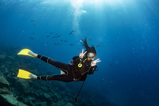 beautiful latina mexican girl diving in cortez sea photo