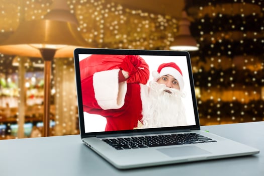 notebook with with display on table. Santa Claus photo